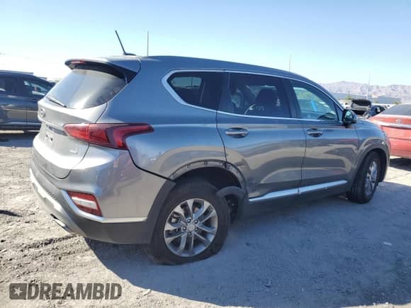 2019 Hyundai Santa Fe SE z VIN 5NMS2CAD3KH095873, wystawiony jako Copart lot #85199995 z przebiegiem 68 309 mil mil oraz Szkoda całkowita • Salvage title. Historia ofert i sprzedaży dostępna na DreamBid. Obrazek 3.