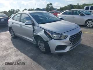 2020 Hyundai Accent SE z VIN 3KPC24A64LE096647, wystawiony jako IAAI lot #43273654 z przebiegiem 91 665 mil mil oraz . Historia ofert i sprzedaży dostępna na DreamBid. Obrazek 1.