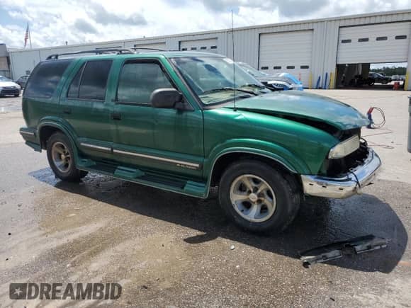 1999 Chevrolet Blazer LT с VIN 1GNCS13W3X2134276, выставлен на аукционе Copart как лот 60829885 с пробегом 237 269 миль миль и Списание • Salvage title. История ставок и продаж доступна на DreamBid. Изображение 4.