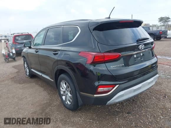 2019 Hyundai Santa Fe SE with VIN 5NMS23AD0KH122236, listed as a IAAI auction lot 42265064 with 101,173 mi miles and . Bid and sale history available at DreamBid. Image 3.