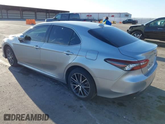 2023 Toyota Camry Hybrid XLE с VIN 4T1F31AK4PU604107, выставлен на аукционе IAAI как лот 41824999 с пробегом 52 316 миль миль и . История ставок и продаж доступна на DreamBid. Изображение 3.