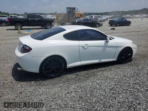 2007 Hyundai Tiburon GT с VIN KMHHN66F17U252700, выставлен на аукционе Copart как лот 62289695 с пробегом 96 467 миль миль и Списание • Salvage title. История ставок и продаж доступна на DreamBid. Изображение 3.