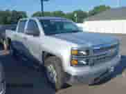 2014 Chevrolet Silverado 1500 LT with VIN 3GCPCREHXEG259073, listed as a IAAI auction lot 43010013 with 128,000 mi miles and . Bid and sale history available at DreamBid. Image 1.