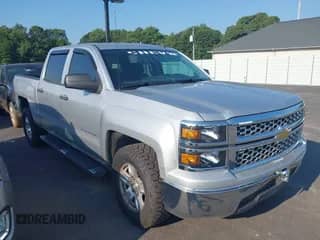 2014 Chevrolet Silverado 1500 LT with VIN 3GCPCREHXEG259073, listed as a IAAI auction lot 43010013 with 128,000 mi miles and . Bid and sale history available at DreamBid. Image 1.