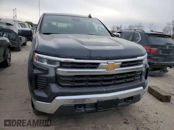 2023 Chevrolet Silverado 1500 LT with VIN 1GCRDDED4PZ314318, listed as a Copart auction lot 42052525 with 27,815 mi miles and Salvage title. Bid and sale history available at DreamBid. Image 5.