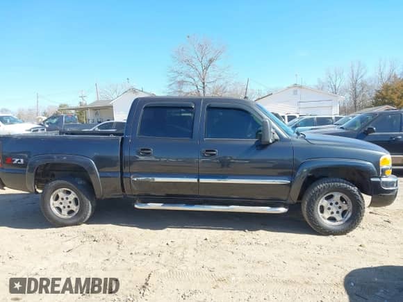 2004 GMC Sierra 1500 SLE with VIN 2GTEK13T941431569, listed as a IAAI auction lot 41715447 with 195,687 mi miles and . Bid and sale history available at DreamBid. Image 14.