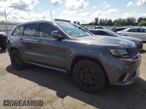 2021 Jeep Grand Cherokee Trackhawk z VIN 1C4RJFN99MC822394, wystawiony jako Copart lot #63350645 z przebiegiem Nie podano mil oraz Szkoda całkowita • Salvage title. Historia ofert i sprzedaży dostępna na DreamBid. Obrazek 4.