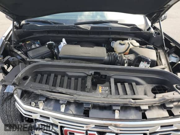 2023 GMC Sierra 1500 Denali z VIN 3GTUUGED2PG233216, wystawiony jako Copart lot #84449105 z przebiegiem 17 876 mil mil oraz Szkoda całkowita • Salvage title. Historia ofert i sprzedaży dostępna na DreamBid. Obrazek 11.
