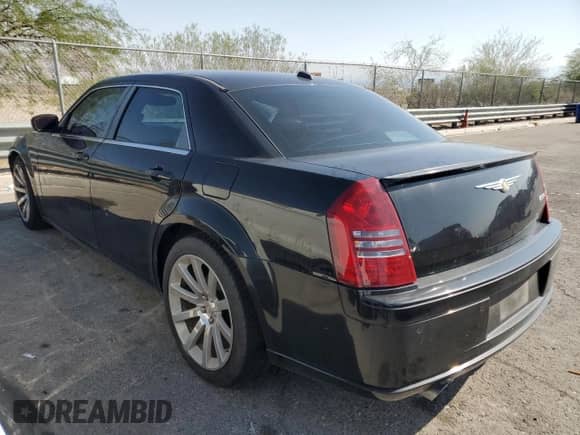 2006 Chrysler 300 C SRT-8 с VIN 2C3LA73W56H102728, выставлен на аукционе Copart как лот 63040605 с пробегом 145 411 миль миль и Чистый • Clean title. История ставок и продаж доступна на DreamBid. Изображение 2.