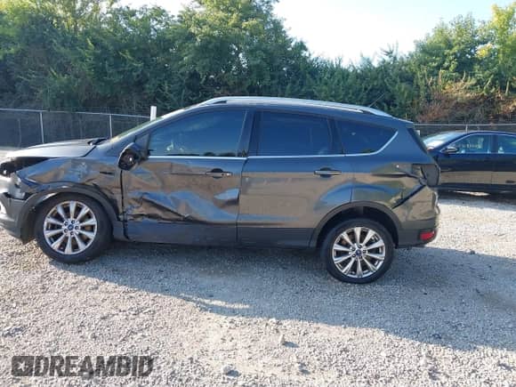 2017 Ford Escape Titanium with VIN 1FMCU9J93HUA31245, listed as a IAAI auction lot 43171442 with 148,219 mi miles and . Bid and sale history available at DreamBid. Image 15.