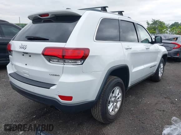 2020 Jeep Grand Cherokee Altitude z VIN 1C4RJFAG8LC207774, wystawiony jako IAAI lot #42869515 z przebiegiem 36 455 mil mil oraz . Historia ofert i sprzedaży dostępna na DreamBid. Obrazek 4.