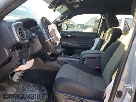 2021 Toyota Tacoma SR with VIN 3TMCZ5AN1MM425739, listed as a Copart auction lot 84917565 with 77,559 mi miles and Clean title. Bid and sale history available at DreamBid. Image 7.