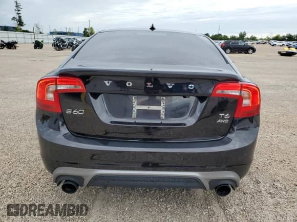 2015 Volvo S60 с VIN YV1902TL2F2368342, выставлен на аукционе Copart как лот 63053745 с пробегом 72 095 миль миль и Списание • Salvage title. История ставок и продаж доступна на DreamBid. Изображение 6.
