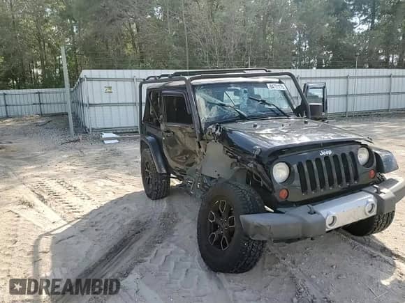 2012 Jeep Wrangler Sahara with VIN 1C4AJWBG0CL249027, listed as a Copart auction lot 84701175 with 91,717 mi miles and Salvage title. Bid and sale history available at DreamBid. Image 13.