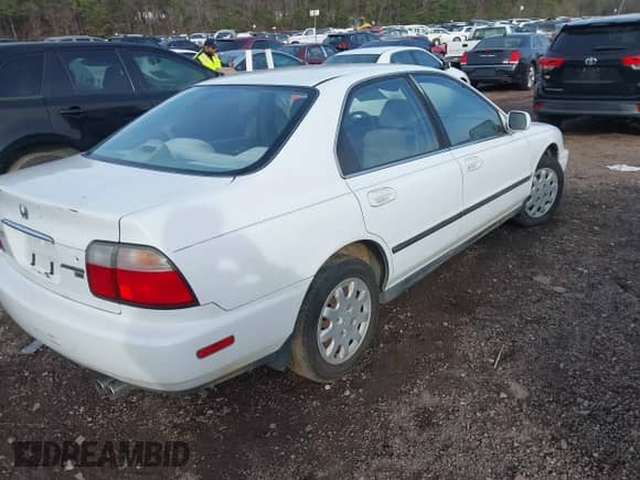 1996 Honda Accord with VIN 1HGCE664XTA021305, listed as a IAAI auction lot 41600685 with 151,320 mi miles and . Bid and sale history available at DreamBid. Image 4.