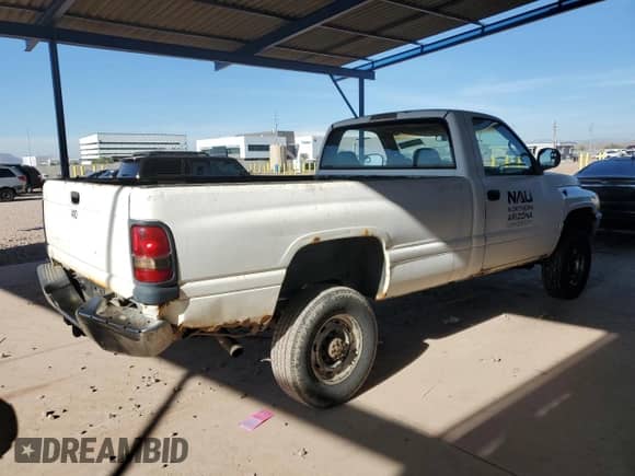 1999 Dodge 2500 with VIN 3B7KF26ZXXM554310, listed as a Copart auction lot 85656864 with 136,195 mi miles and Salvage title. Bid and sale history available at DreamBid. Image 3.