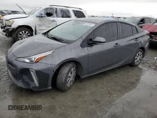 2019 Toyota Prius LE with VIN JTDL9RFU4K3011215, listed as a Copart auction lot 82524815 with 130,204 mi miles and Salvage title. Bid and sale history available at DreamBid. Image 1.