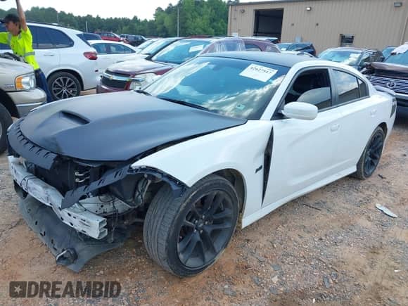 2020 Dodge Charger R/T with VIN 2C3CDXCT7LH166293, listed as a IAAI auction lot 42627517 with 66,230 mi miles and . Bid and sale history available at DreamBid. Image 18.