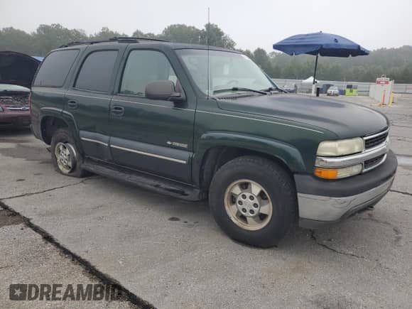 2002 Chevrolet Tahoe Z71 с VIN 1GNEK13Z52R325832, выставлен на аукционе Copart как лот 71494415 с пробегом Не указан миль и Списание • Salvage title. История ставок и продаж доступна на DreamBid. Изображение 4.