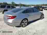 2018 Honda Accord Touring z VIN 1HGCV2F91JA006919, wystawiony jako Copart lot #82345515 z przebiegiem 128 886 mil mil oraz Szkoda całkowita • Salvage title. Historia ofert i sprzedaży dostępna na DreamBid. Obrazek 3.