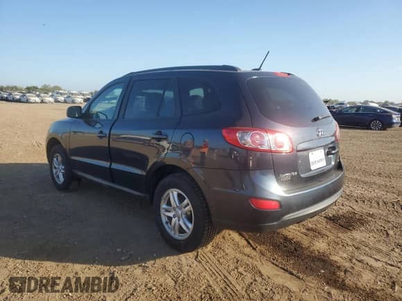 2012 Hyundai Santa Fe GLS z VIN 5XYZGDAB1CG092812, wystawiony jako Copart lot #84626635 z przebiegiem Nie podano mil oraz Szkoda całkowita • Salvage title. Historia ofert i sprzedaży dostępna na DreamBid. Obrazek 2.