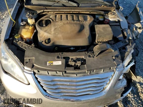 2014 Chrysler 200 LX с VIN 1C3CCBAG7EN101465, выставлен на аукционе Copart как лот 86891255 с пробегом 145 249 миль миль и Списание • Salvage title. История ставок и продаж доступна на DreamBid. Изображение 11.