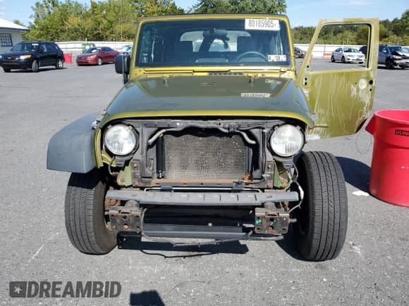 2008 Jeep Wrangler X z VIN 1J4FA24168L525400, wystawiony jako Copart lot #80185905 z przebiegiem 72 640 mil mil oraz Szkoda całkowita • Salvage title. Historia ofert i sprzedaży dostępna na DreamBid. Obrazek 5.