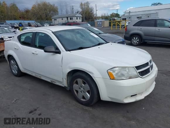 2010 Dodge Avenger SXT with VIN 1B3CC4FB1AN184830, listed as a IAAI auction lot 43525764 with 135,610 mi miles and . Bid and sale history available at DreamBid. Image 1.