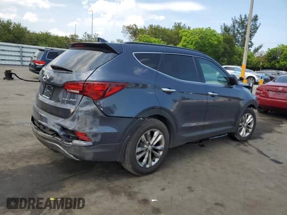 2017 Hyundai Santa Fe 2.0T с VIN 5XYZU4LA0HG489223, выставлен на аукционе Copart как лот 58305925 с пробегом 98 562 миль миль и Списание • Salvage title. История ставок и продаж доступна на DreamBid. Изображение 3.