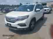 2017 Honda Pilot EX-L with VIN 5FNYF6H77HB017722, listed as a IAAI auction lot 42800151 with 94,457 mi miles and . Bid and sale history available at DreamBid. Image 2.