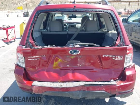 2012 Subaru Forester X Limited z VIN JF2SHAEC4CH411547, wystawiony jako IAAI lot #42444452 z przebiegiem 112 797 mil mil oraz . Historia ofert i sprzedaży dostępna na DreamBid. Obrazek 6.