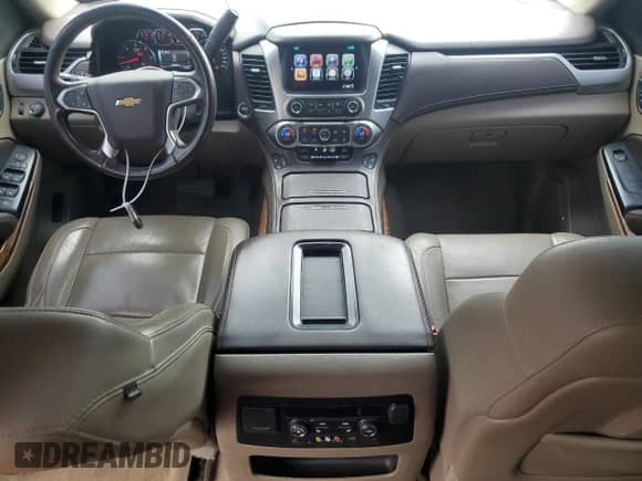 2015 Chevrolet Suburban LTZ с VIN 1GNSKKKC1FR137921, выставлен на аукционе Copart как лот 70644505 с пробегом 218 182 миль миль и Списание • Salvage title. История ставок и продаж доступна на DreamBid. Изображение 8.