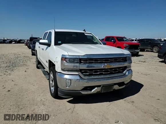2018 Chevrolet Silverado 1500 LTZ z VIN 3GCUKSEC7JG536936, wystawiony jako Copart lot #70294205 z przebiegiem 158 903 mil mil oraz Szkoda całkowita • Salvage title. Historia ofert i sprzedaży dostępna na DreamBid. Obrazek 13.
