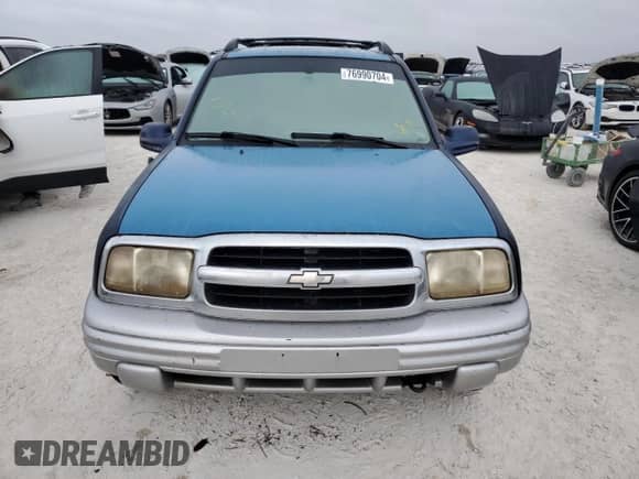 2002 Chevrolet Tracker LT с VIN 2CNBE634126928532, выставлен на аукционе Copart как лот 76990704 с пробегом Не указан миль и Списание • Salvage title. История ставок и продаж доступна на DreamBid. Изображение 5.