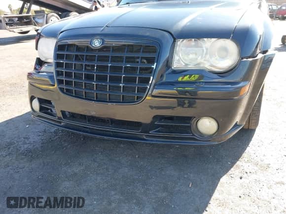 2006 Chrysler 300 C SRT-8 with VIN 2C3LA73W86H388896, listed as a IAAI auction lot 40599030 with 152,547 mi miles and . Bid and sale history available at DreamBid. Image 6.