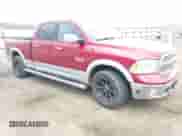 2014 Ram 1500 Laramie z VIN 1C6RR7VM5ES297951, wystawiony jako IAAI lot #42361374 z przebiegiem 210 193 mil mil oraz . Historia ofert i sprzedaży dostępna na DreamBid. Obrazek 1.