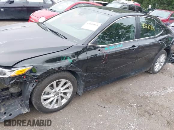 2023 Toyota Camry LE z VIN 4T1R11AK7PU130043, wystawiony jako IAAI lot #43289865 z przebiegiem 24 472 mil mil oraz . Historia ofert i sprzedaży dostępna na DreamBid. Obrazek 18.