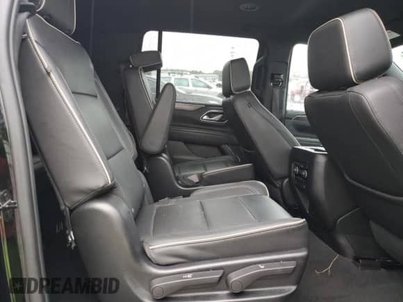 2023 Chevrolet Suburban Premier with VIN 1GNSKFKD1PR184075, listed as a Copart auction lot 81792555 with 74,078 mi miles and Salvage title. Bid and sale history available at DreamBid. Image 11.