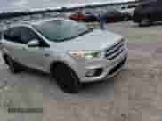 2017 Ford Escape Titanium с VIN 1FMCU0JD9HUD04723, выставлен на аукционе Copart как лот 87801365 с пробегом 126 452 миль миль и Списание • Salvage title. История ставок и продаж доступна на DreamBid. Изображение 11.