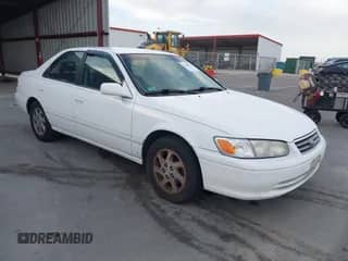 2000 Toyota Camry LE z VIN JT2BG22K7Y0406439, wystawiony jako IAAI lot #43483925 z przebiegiem 125 778 mil mil oraz . Historia ofert i sprzedaży dostępna na DreamBid. Obrazek 1.