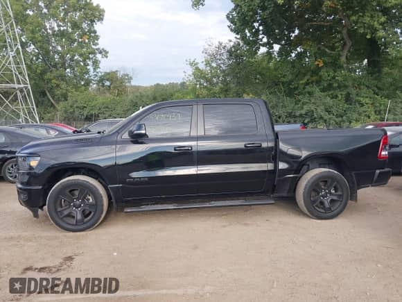 2020 Ram 1500 Lone Star with VIN 1C6SRFFT0LN402604, listed as a IAAI auction lot 43190437 with 80,517 mi miles and . Bid and sale history available at DreamBid. Image 14.