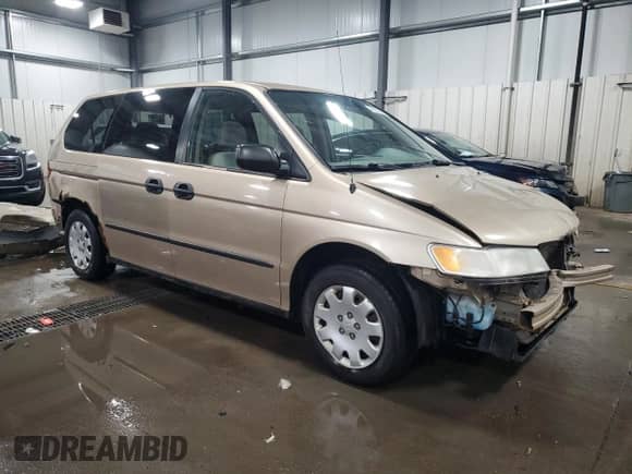 2000 Honda Odyssey LX с VIN 2HKRL1851YH612307, выставлен на аукционе Copart как лот 46403965 с пробегом 278 665 миль миль и Списание • Salvage title. История ставок и продаж доступна на DreamBid. Изображение 4.