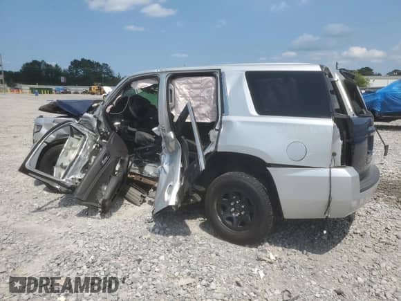 2015 Chevrolet Tahoe Commercial with VIN 1GNLC2EC4FR277653, listed as a Copart auction lot 69478765 with Not provided miles and Salvage title. Bid and sale history available at DreamBid. Image 2.