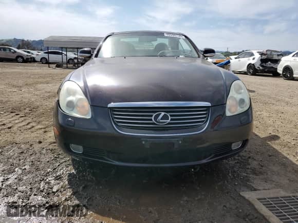 2004 Lexus SC 430 with VIN JTHFN48Y640056039, listed as a Copart auction lot 48590735 with 117,295 mi miles and Salvage title. Bid and sale history available at DreamBid. Image 5.