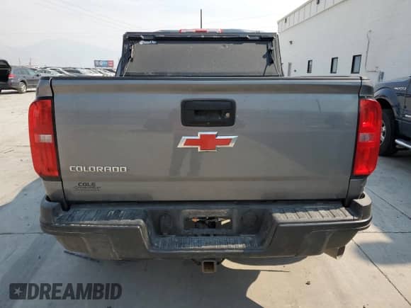 2020 Chevrolet Colorado 4WD ZR2 с VIN 1GCPTEE1XL1183958, выставлен на аукционе Copart как лот 65965574 с пробегом 85 035 миль миль и Списание • Salvage title. История ставок и продаж доступна на DreamBid. Изображение 6.
