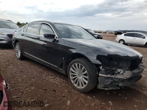 2018 BMW 7 Series 740e xDrive with VIN WBA7J2C52JG938425, listed as a Copart auction lot 85164975 with 56,221 mi miles and Salvage title. Bid and sale history available at DreamBid. Image 4.