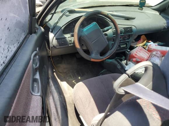 1998 Chevrolet Cavalier with VIN 1G1JF12TXW7102446, listed as a Copart auction lot 58949874 with 70,650 mi miles and Clean title. Bid and sale history available at DreamBid. Image 8.