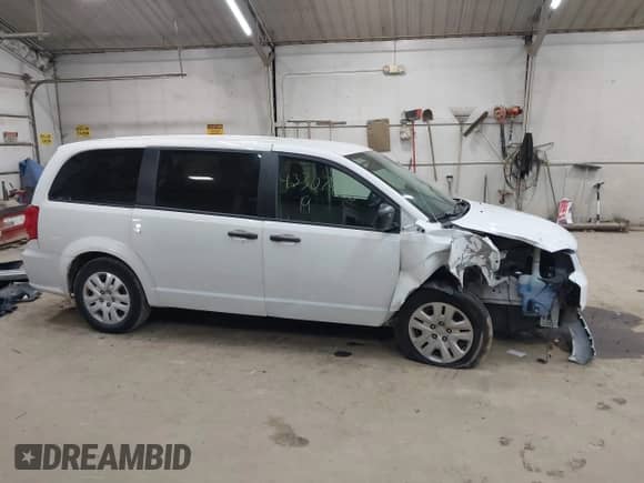 2019 Dodge Grand Caravan SE with VIN 2C4RDGBG7KR664965, listed as a IAAI auction lot 43307945 with 46,507 mi miles and . Bid and sale history available at DreamBid. Image 13.