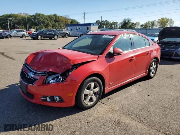 2012 Chevrolet Cruze 1LT with VIN 1G1PF5SC1C7328100, listed as a Copart auction lot 82187865 with 164,649 mi miles and Salvage title. Bid and sale history available at DreamBid. Image 1.