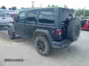 2021 Jeep Wrangler Unlimited Willys with VIN 1C4HJXDN7MW504854, listed as a IAAI auction lot 42605357 with 74,092 mi miles and . Bid and sale history available at DreamBid. Image 3.